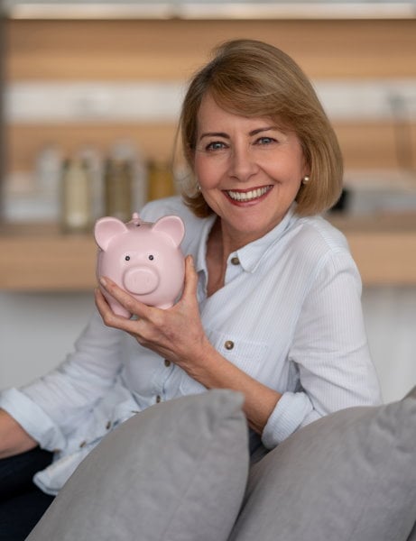 woman-holding-piggy-bank